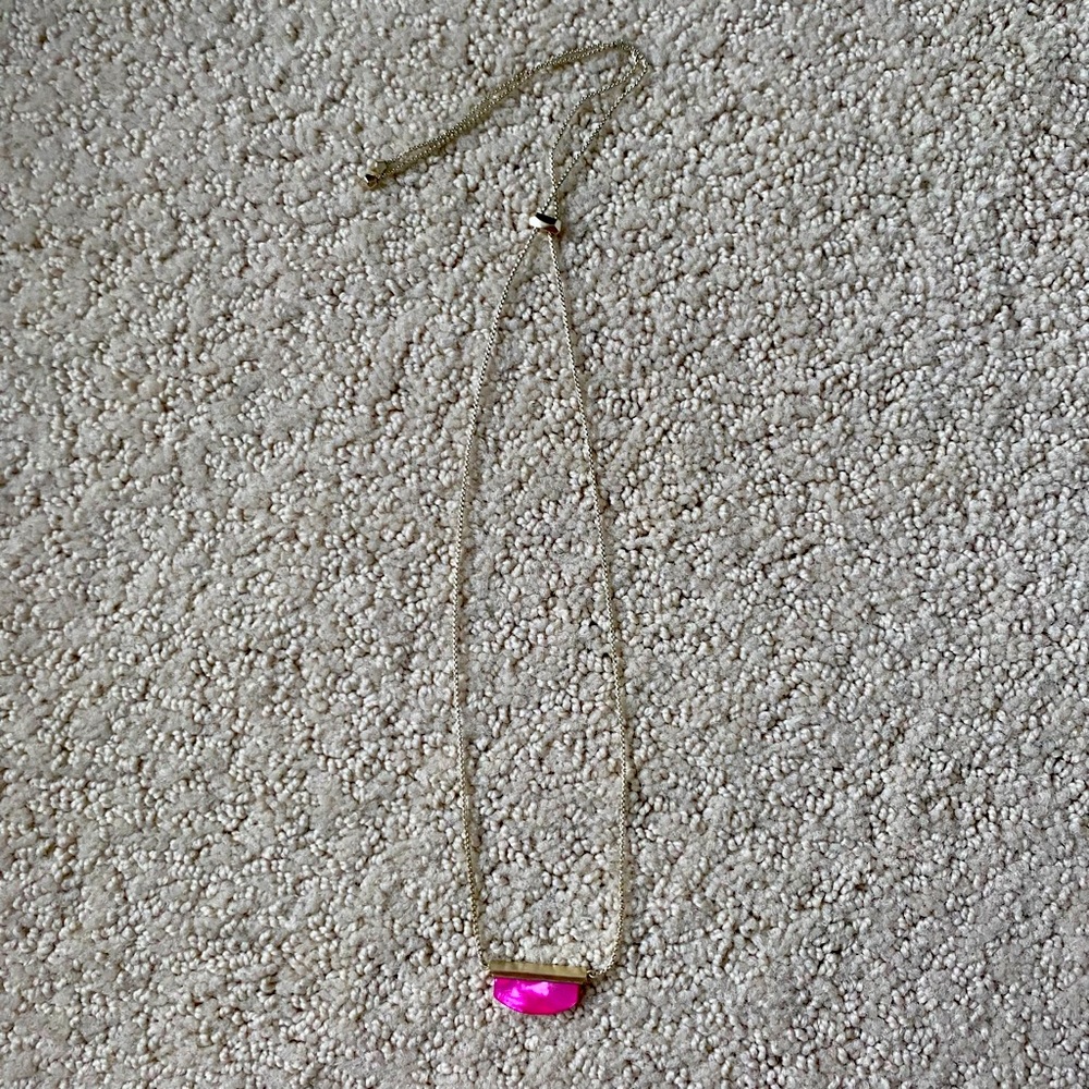 Kendra Scott necklace and matching bracelet in hot pink.